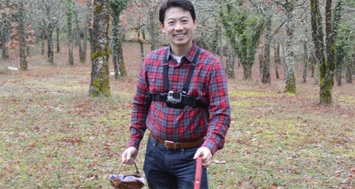 Robert Chang standing in truffle orchard in France